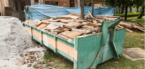 Pile of wood in a dumpster