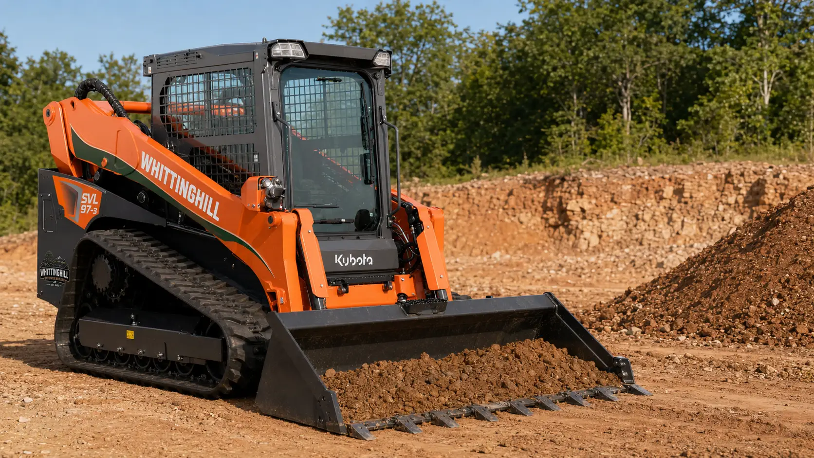 Orange track loader moving earth